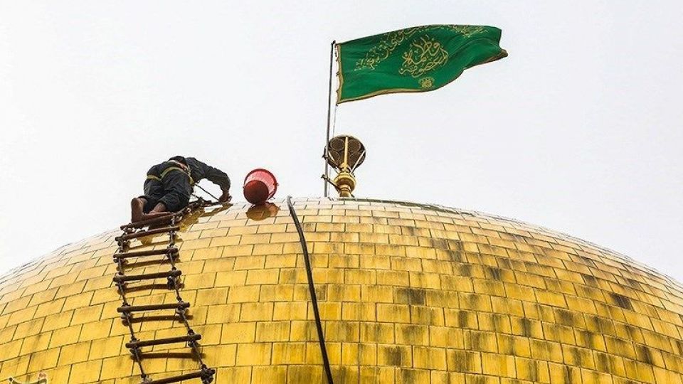  شستشوی گنبد حرم حضرت معصومه (س)