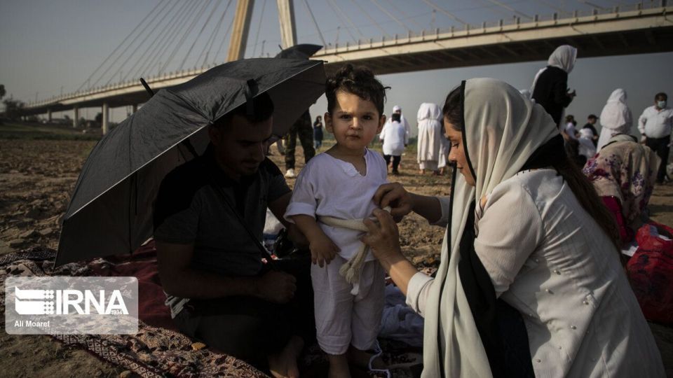 مراسم غسل تعمید کودکان مندایی