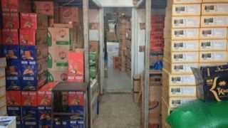  کشف انبار میلیاردی مواد غذایی احتکارشده در آستانه اشرفیه