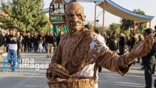 آیین «گِلمالی» عاشورا - شهر بِن آیین «گِلمالی» عاشورا - شهر بِن