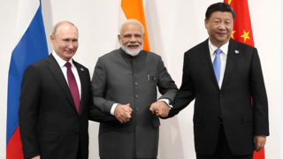 درماندگی ترامپ در برابر اتحاد هند و روسیه و چین به روایت کاریکاتور